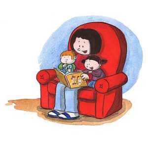 Mother in a red armchair reads a book to two children sitting with her