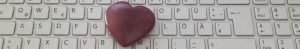 dunkles Herz auf Tastatur